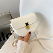 Γυναικεία μίνι τσάντα με μεταλλική στερέωση