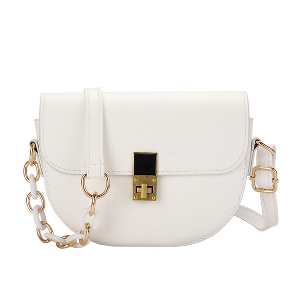 Γυναικεία μίνι τσάντα με μεταλλική στερέωση