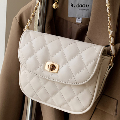 Γυναικεία τσάντα με επένδυση με μεταλλική στερέωση