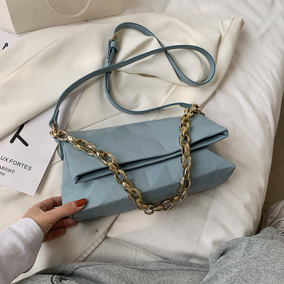 Geanta de dama dreptunghiulara din piele ecologica cu maner din metal si piele