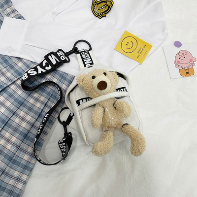 Dāmas soma ar uzrakstu un plīša rotaļlietu