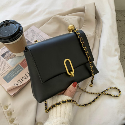 Μοντέρνα έκο δερμάτινη τσάντα με μεταλλική στερέωση