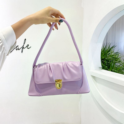 Γυναικεία έκο δερμάτινη τσάντα με μεταλλικό κούμπωμα και λαβή