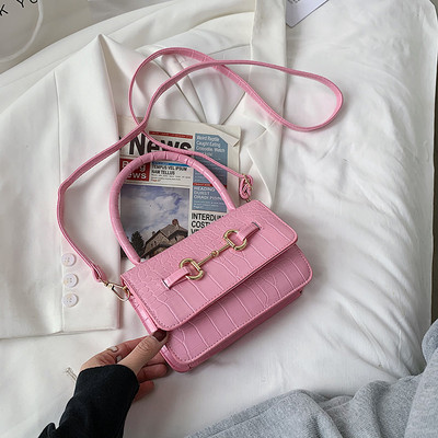 Γυναικεία έκο δερμάτινη τσάντα με μεταλλική διακόσμηση - δύο λαβές