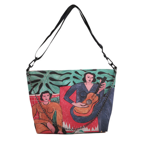 Γυναικεία τσάντα με χρωματιστό απλικέ και μεταλλικό στοιχείο