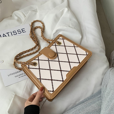 Μικρή οικολογική δερμάτινη τσάντα με μεταλλική λαβή