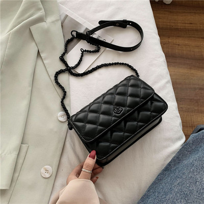 Γυναικεία έκο δερμάτινη τσάντα με μακριά λαβή και μεταλλικό κούμπωμα