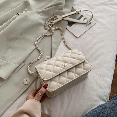 Γυναικεία έκο δερμάτινη τσάντα με μακριά λαβή και μεταλλικό κούμπωμα