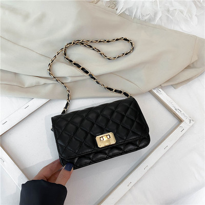 Γυναικεία έκο δερμάτινη τσάντα με μεταλλική στερέωση σε τέσσερα χρώματα