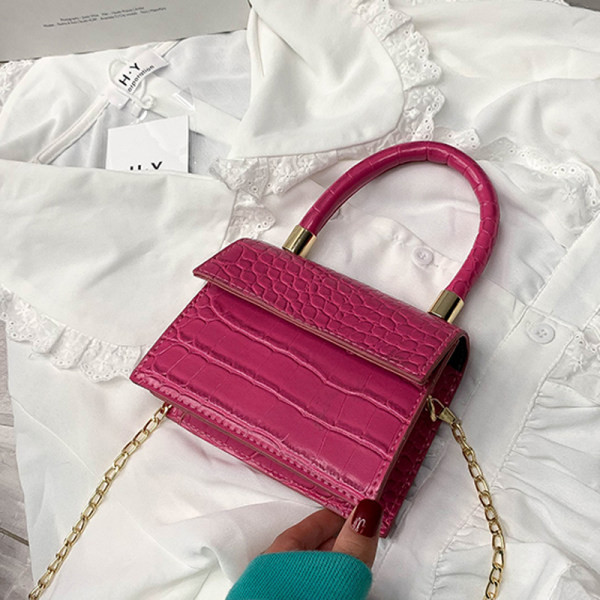 Elegantiška kelių spalvų moteriška rankinė su metalinėmis rankenomis