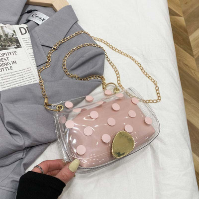 Γυναικεία διαφανή πουά τσάντα  με μεταλλική λαβή