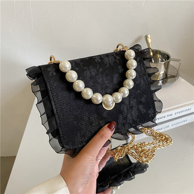 Γυναικεία μίνι τσάντα με δαντέλα και πέρλες