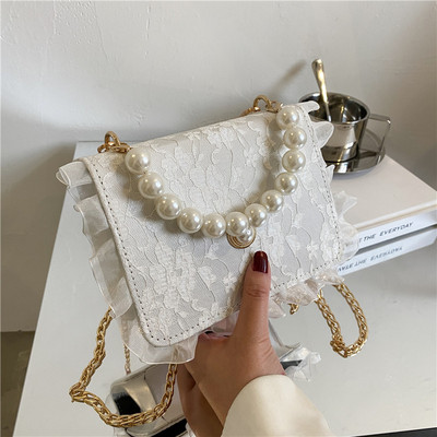 Γυναικεία μίνι τσάντα με δαντέλα και πέρλες