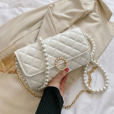 Γυναικεία καπιτονέ τσάντα με μακρύ λαβή από πέρλες 