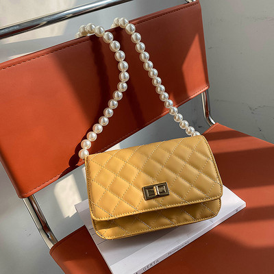 Γυναικεία έκο δερμάτινη τσάντα με πέρλες