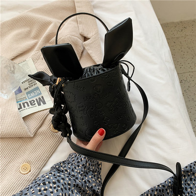 Γυναικεία τσάντα νέο μοντέλο με κορδέλα και μακριά λαβή