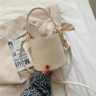 Γυναικεία τσάντα νέο μοντέλο με κορδέλα και μακριά λαβή