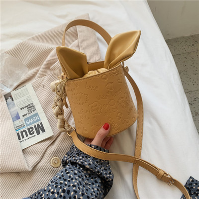 Γυναικεία τσάντα νέο μοντέλο με κορδέλα και μακριά λαβή