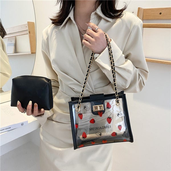 Γυναικεία διαφανής τσάντα με μεταλλική αγκράφα