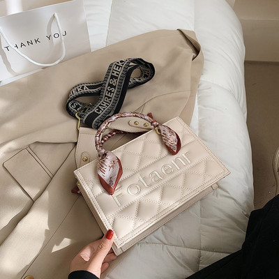 Naiste nahast kott pikkade ja lühikeste sangadega