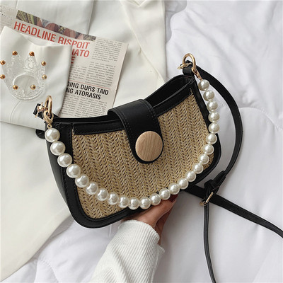 Γυναικεία τσάντα με δερμάτινη λαβή και πέρλες