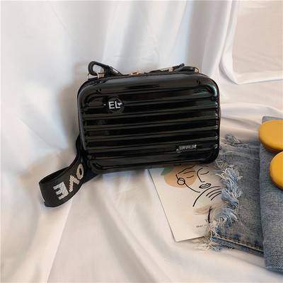 Γυναικεία τσάντα νέο μοντέλο  τύπου χαρτοφύλακα με υφασμάτινη, μακριά, λαβή