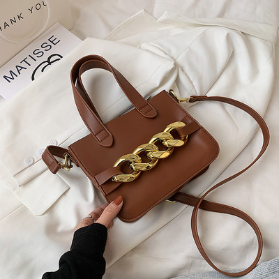 Geanta mica din piele cu doua manere si decor metalic