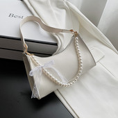 Γυναικεία έκο δερμάτινη τσάντα με κοντή λαβή από πέρλες και κορδέλα