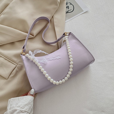 Γυναικεία έκο δερμάτινη τσάντα με κοντή λαβή από πέρλες και κορδέλα