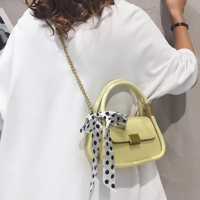 Sieviešu soma ar punktu lentu un diviem rokturiem