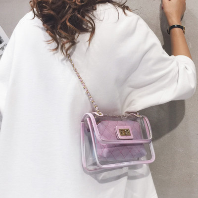 Διαφανής γυναικεία τσάντα με μακριά μεταλλική λαβή