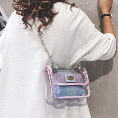 Διαφανής γυναικεία τσάντα με μακριά μεταλλική λαβή