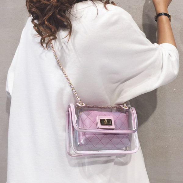 Διαφανής γυναικεία τσάντα με μακριά μεταλλική λαβή