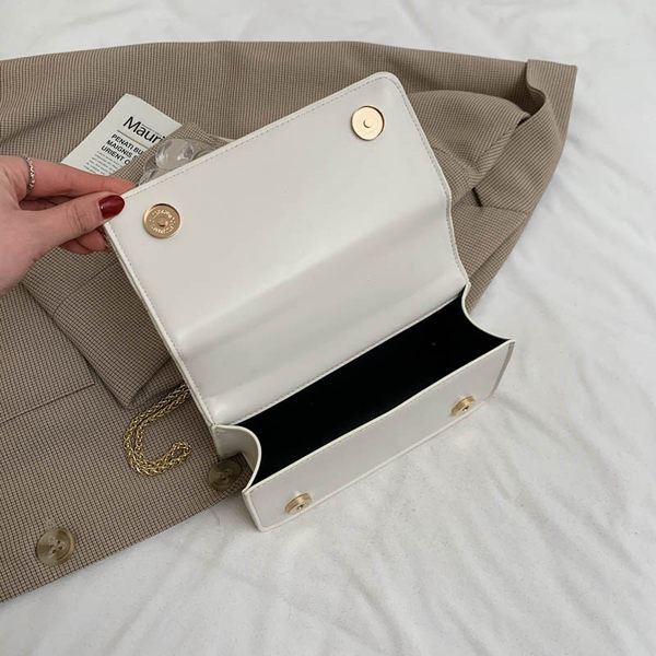 Geanta eleganta din piele cu maner metalic