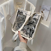 Γυναικεία διαφανής τσάντα με επιγραφή και μακριά λαβή