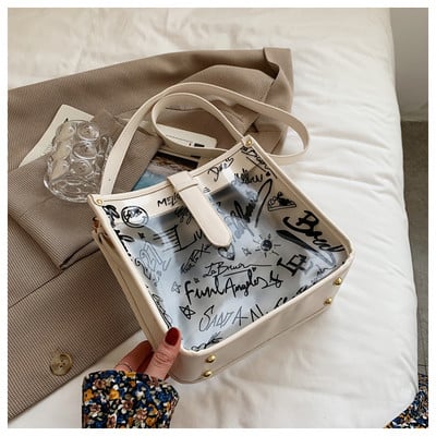 Γυναικεία διαφανής τσάντα με επιγραφή και μακριά λαβή