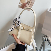 Γυναικεία έκο δερμάτινη τσάντα με κορδέλα και τρουξ