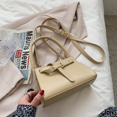 Γυναικεία έκο δερμάτινη τσάντα με κορδέλα και τρουξ