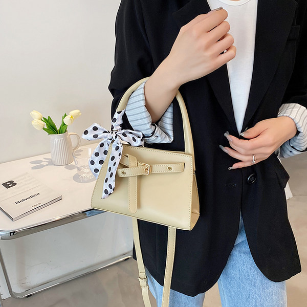 Γυναικεία έκο δερμάτινη τσάντα με κορδέλα και τρουξ