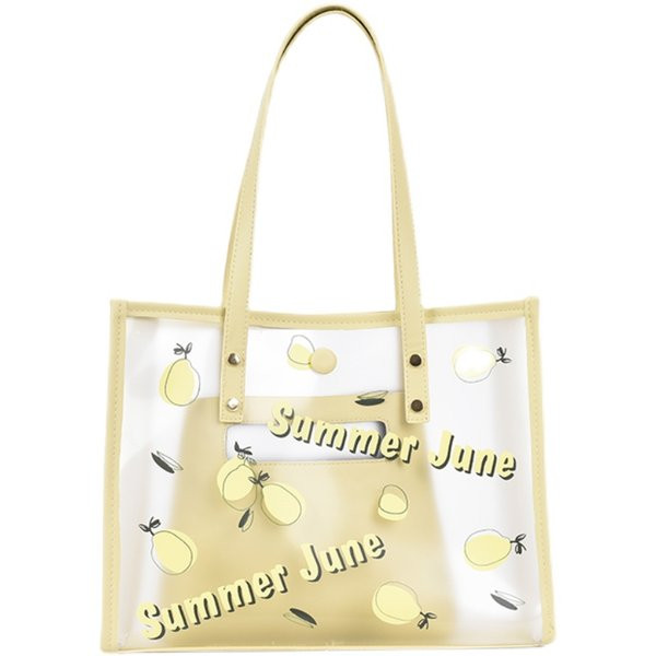 Caurspīdīga sieviešu ādas soma ar aplikāciju un uzrakstu