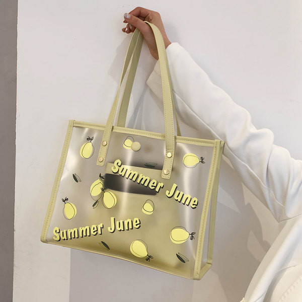 Caurspīdīga sieviešu ādas soma ar aplikāciju un uzrakstu