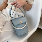 Γυναικεία δερμάτινη τσάντα με μακριά λαβή και πέρλες