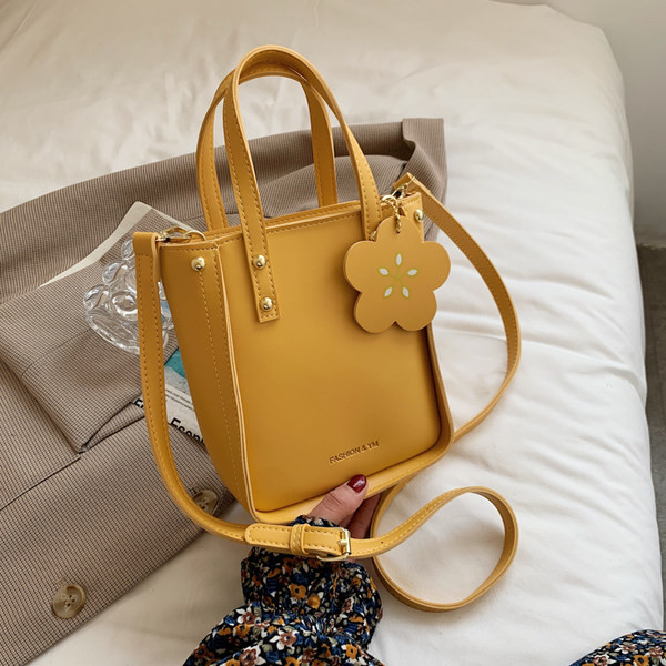 Γυναικεία τσάντα από οικολογικό δέρμα με επιγραφή - με κοντή και μακριά λαβή