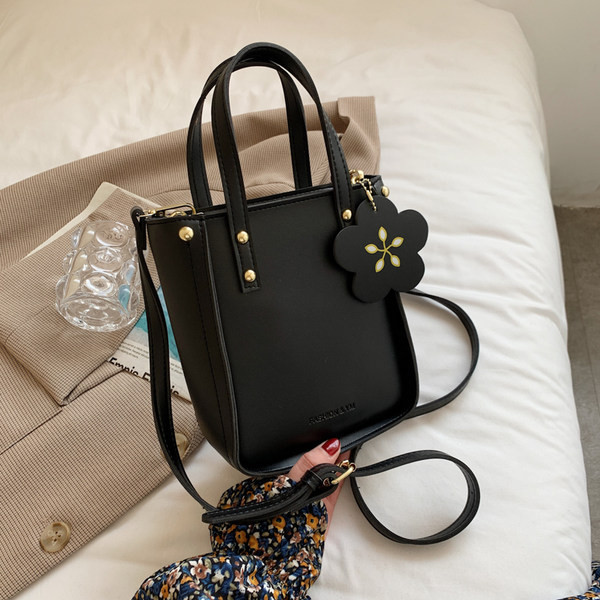 Γυναικεία τσάντα από οικολογικό δέρμα με επιγραφή - με κοντή και μακριά λαβή