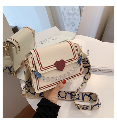 Μικρή μοντέρνα τσάντα eco suede με υφασμάτινη και πέρλες  λαβή