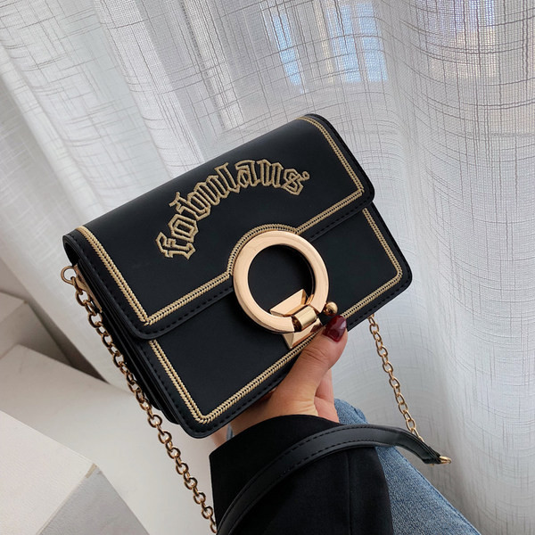 Μικρή μοντέρνα τσάντα eco suede με υφασμάτινη και πέρλες  λαβή