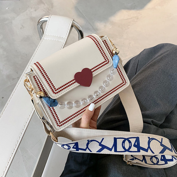 Μικρή μοντέρνα τσάντα eco suede με υφασμάτινη και πέρλες  λαβή