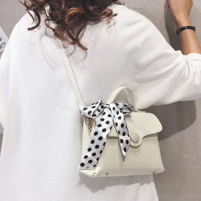 Γυναικεία έκο δερμάτινη τσάντα με κορδέλα πουά και δύο λαβές