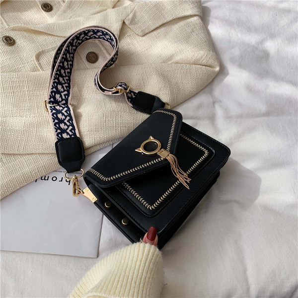 Moderna ženska torba od eko kože s tekstilnom ručkom