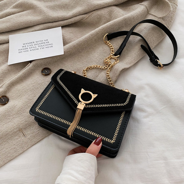 Moderna ženska torba od eko kože s tekstilnom ručkom